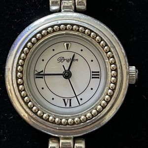 Brighton Silver with gold accents, used